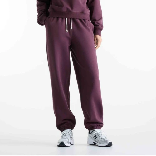 Дамско Долнище New Balance PANT NB ATHLETICS FRENCH TERRY JOGGER - WP41513-YLR