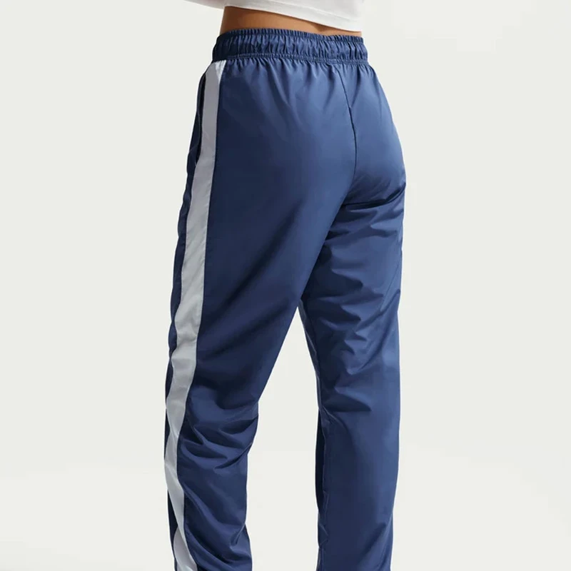 Дамско Долнище Nike W NSW OTG UV ESSNTL WVN MR JG - FV7660-461 Дамско Долнище Nike W NSW OTG UV ESSNTL WVN MR JG - FV7660-461