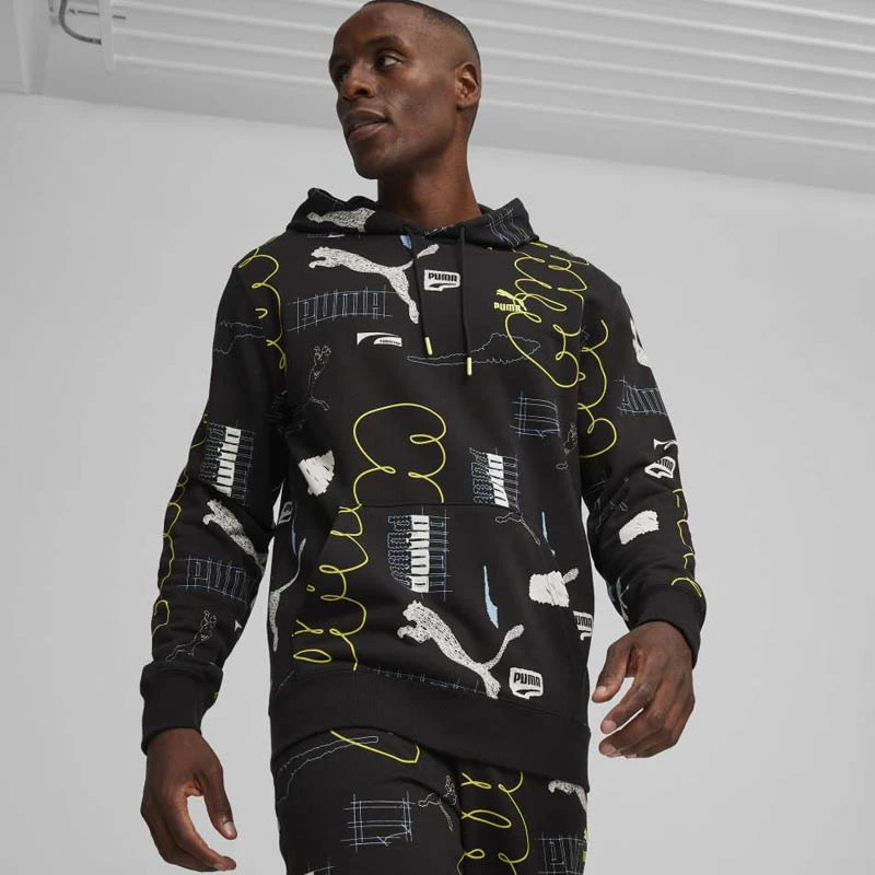 Мъжки Суичър Puma CLASSICS BRAND LOVE AOP Hoodie TR Мъжки Суичър Puma CLASSICS BRAND LOVE AOP Hoodie TR