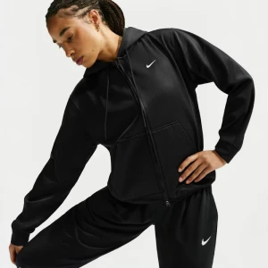 Дамски суитшърт Nike W NK TF STDO FLC SPT STD FZ HD - IO0433-010
