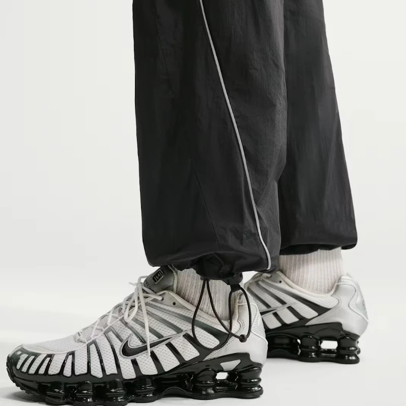 Мъжко долнище Nike M NSW WVN PANT SHOX - IO1434-011 Мъжко долнище Nike M NSW WVN PANT SHOX - IO1434-011
